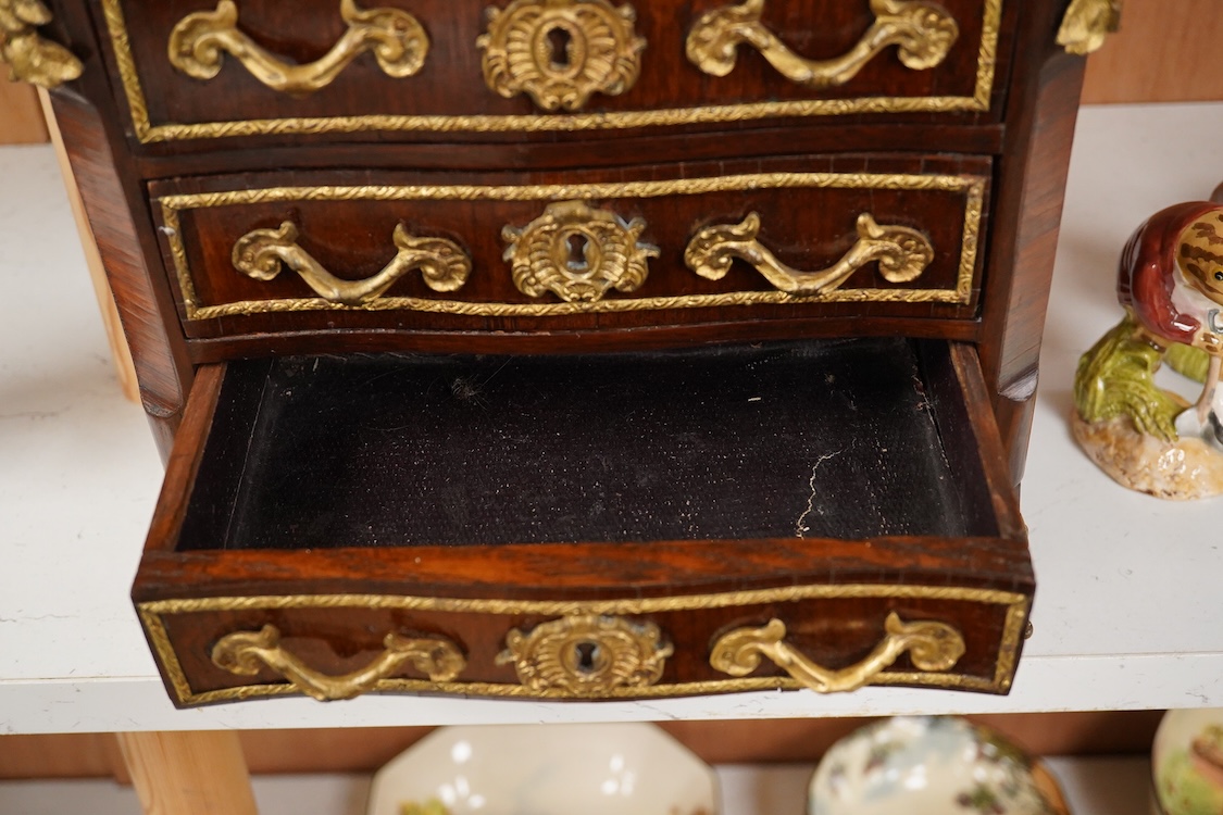 A 19th century French kingwood and gilt metal mounted miniature chest of drawers, 26cm wide x 24cm high